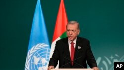 Turkey President Recep Tayyip Erdogan speaks during a plenary session at the COP28 U.N. Climate Summit, in Dubai, United Arab Emirates, Dec. 1, 2023.