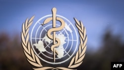 (FILES) The logo of the World Health Organization (WHO) is pictured on the facade of the WHO headquarters on October 24, 2017 in Geneva.