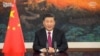 This video grab taken on Jan. 25, 2021, from the website of the World Economic Forum shows China's President Xi Jinping speaking from Pekin as he opens an all-virtual World Economic Forum, which usually takes place in Davos, Switzerland.